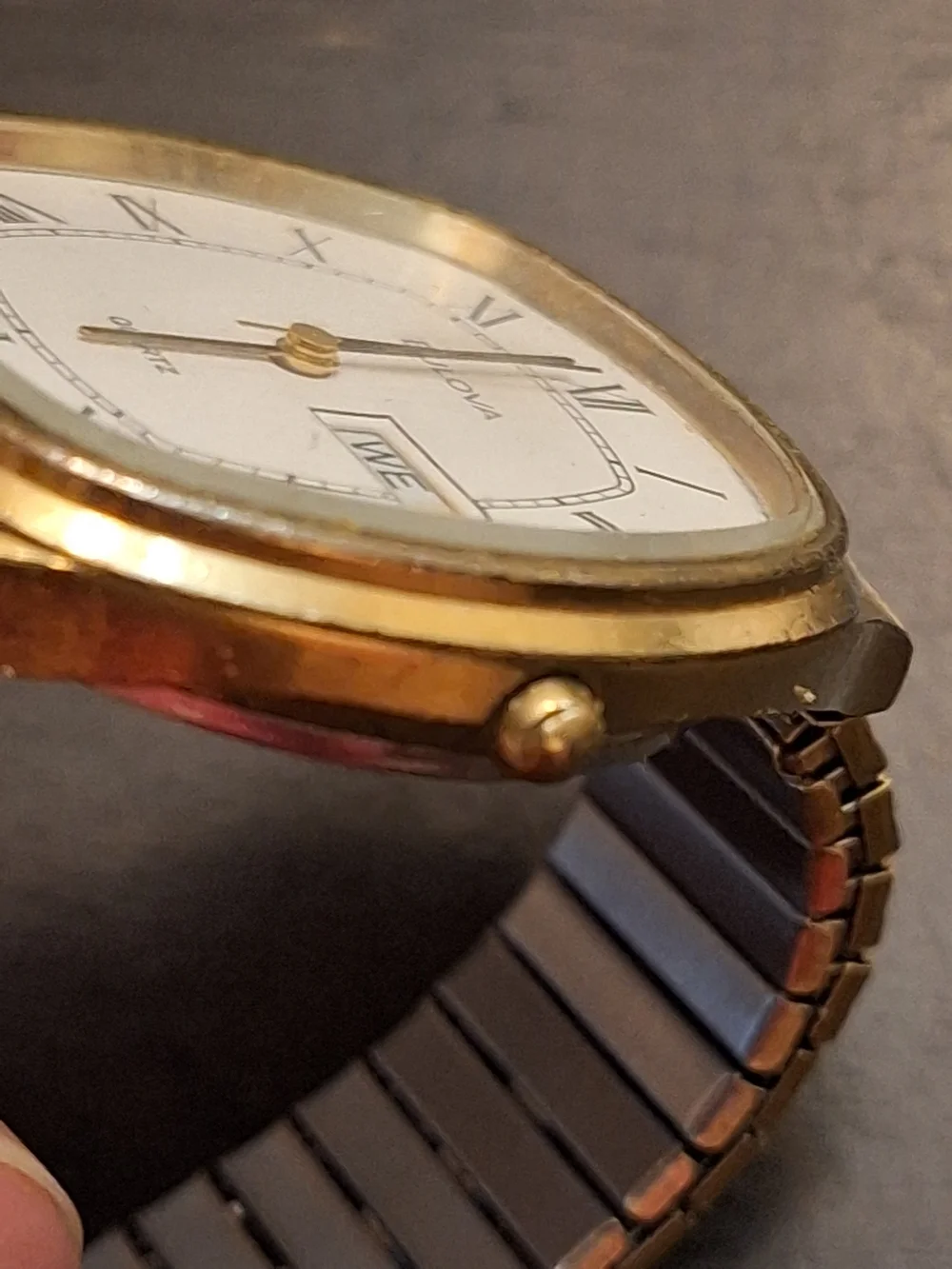 Bulova Gold and White Dress Watch with Roman Numerals‎